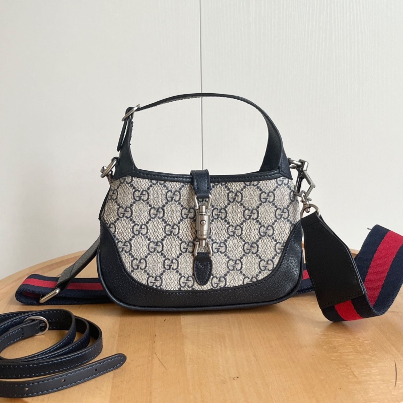 G*u*i top handle bags